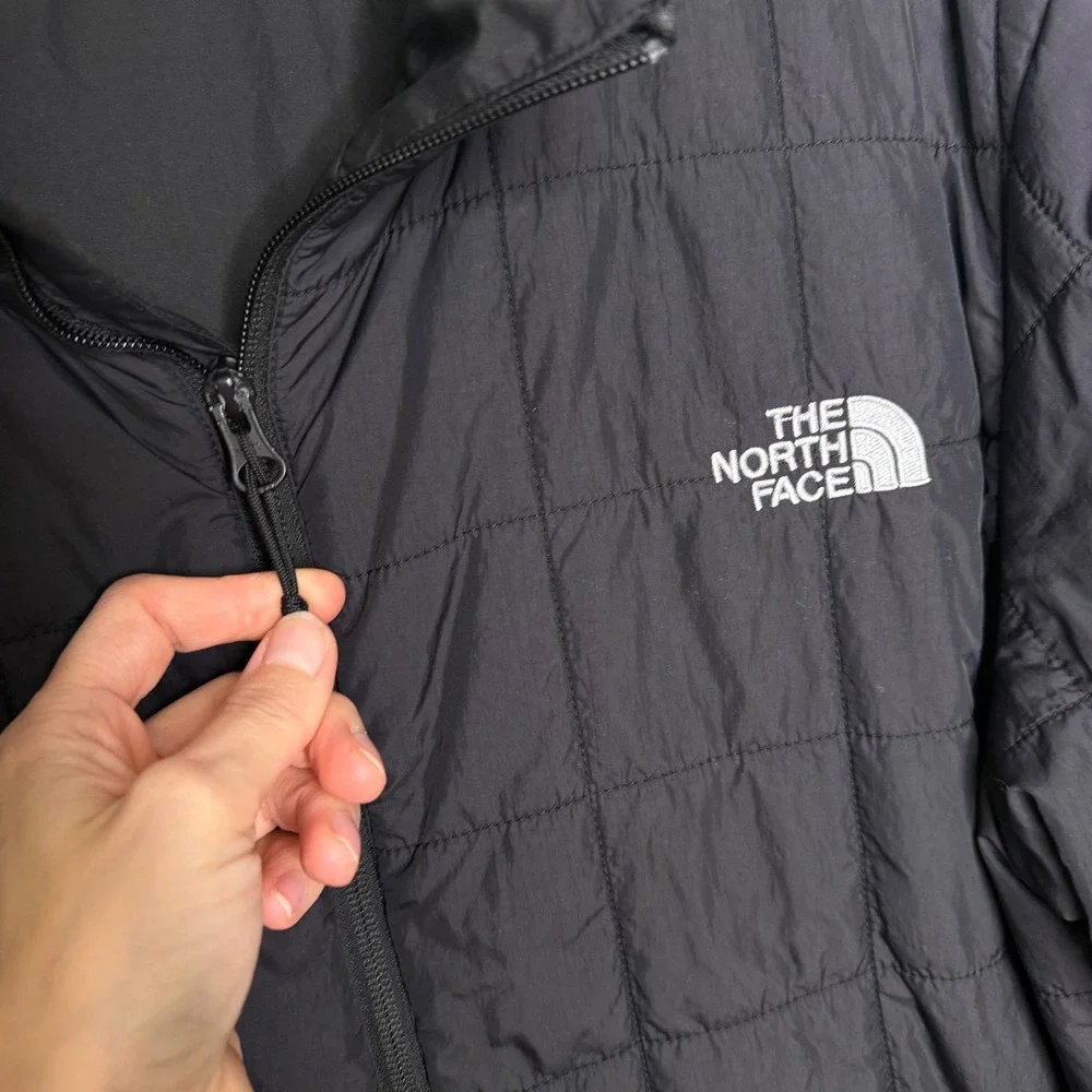 The North Face size pit